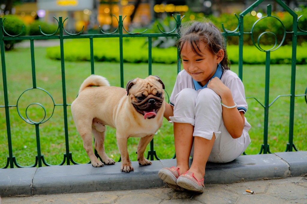 girl and pug
